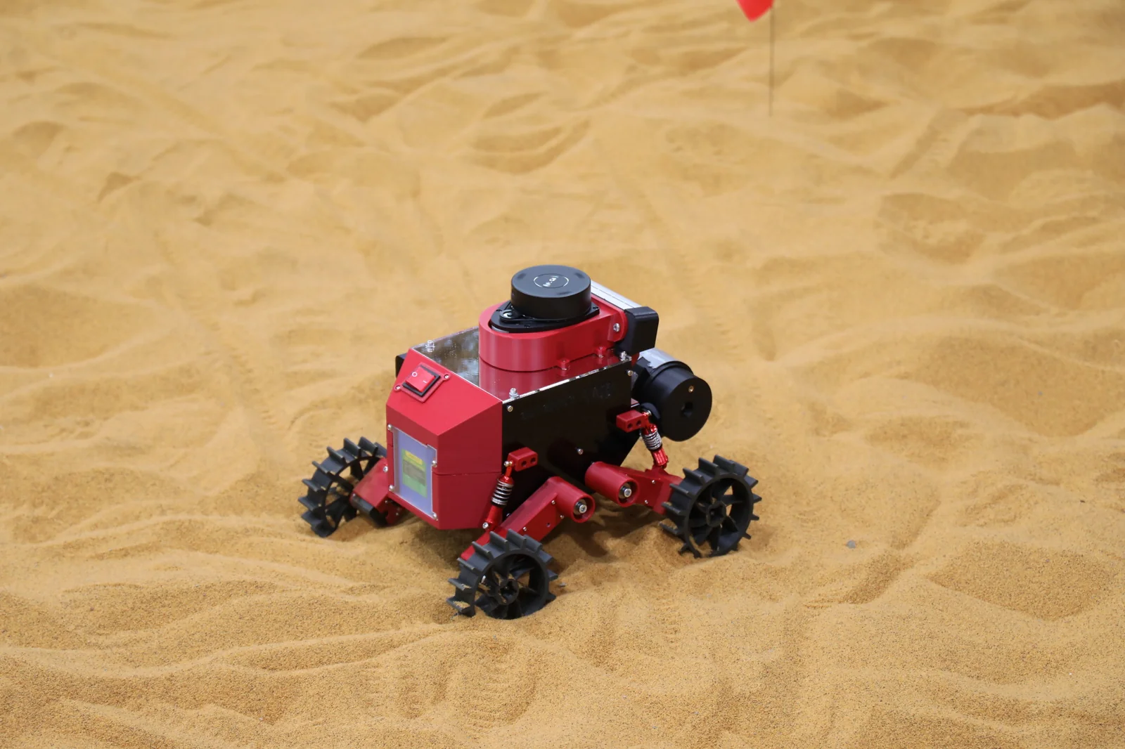 Olympus Advanced rover on the sandy competition course.