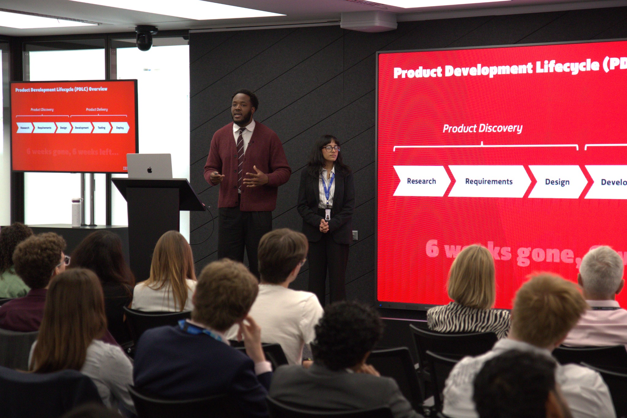 Yusuf presenting the product development workflow at the IBM internship showcase